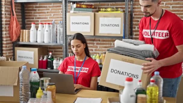 Confident Young Man Woman Volunteers Charity Center Smiling While Working — Stock Video
