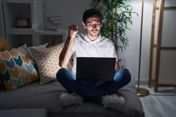 Young Hispanic Man Using Laptop Home Night Angry Mad Raising — Stock Photo, Image