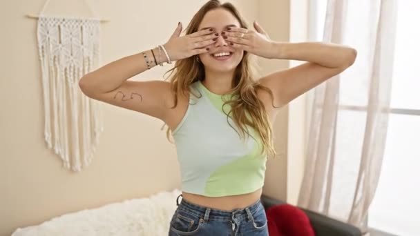 Cheerful Young Hispanic Woman Covering Eyes Hands Playfully Smiling Her — Stock Video