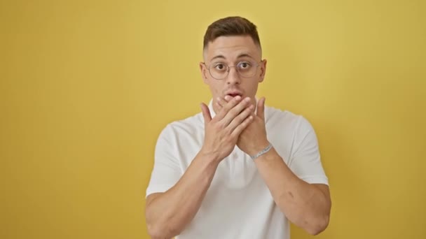 Shocked Young Hispanic Man Covering Mouth Mistake Standing Aghast Amidst — Stock Video