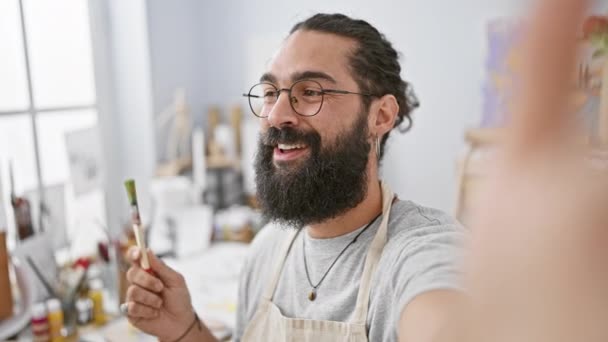 Handsome Bearded Man Painting Bright Art Studio Depicting His Creativity — Stock Video