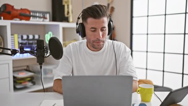 Young Hispanic Man Radio Reporter Wearing Headphones Smiling Radio Studio — Stock Video