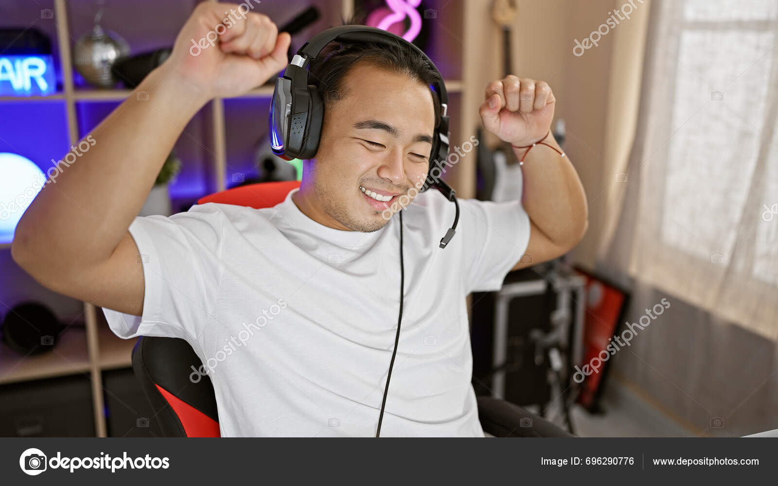 Vibrant Young Chinese Gaming Streamer Confidently Dancing Smiling His Indoor Stock Photo by