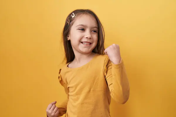 Adorable Hispanic Girl Joyfully Standing Arms Raised Victorious Celebration Success — Stock Photo, Image