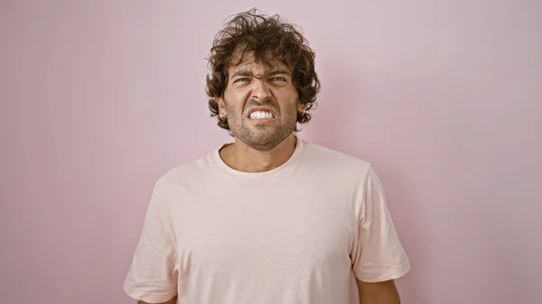 Displeased Young Hispanic Man Casual Shirt Stands Pink Background Grimacing — Stock Photo, Image