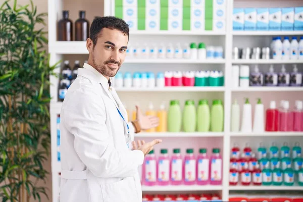 Handsome Hispanic Man Working Pharmacy Drugstore Inviting Enter Smiling Natural — Stock Photo, Image