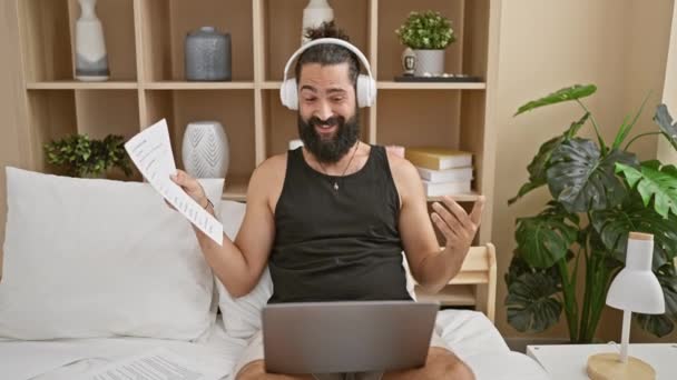 Cheerful Bearded Man Enjoys Video Call His Laptop Cozy Bedroom — Stock Video
