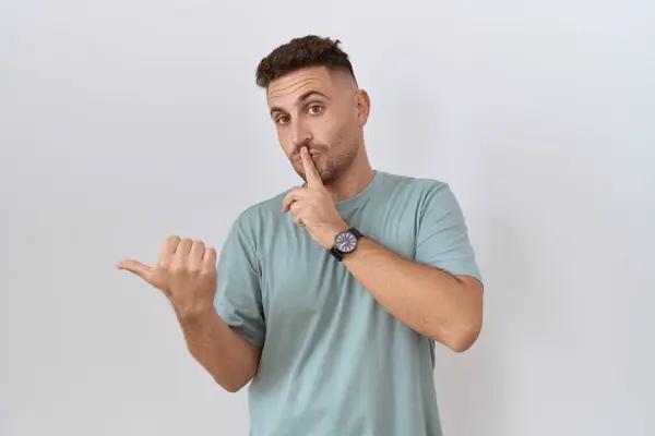 Hispanic Man Beard Standing White Background Asking Quiet Finger Lips — Stock Photo, Image
