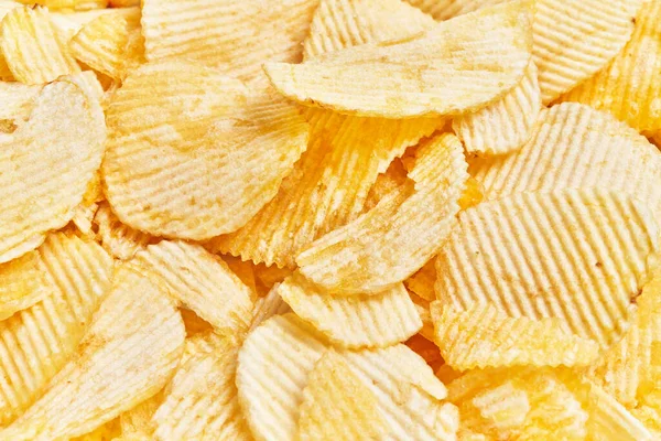 Close Crispy Golden Potato Chips Filling Frame Suggesting Snack Food — Stock Photo, Image