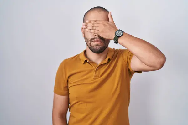 Hispanic Man Beard Standing White Background Covering Eyes Hand Looking — Stock Photo, Image