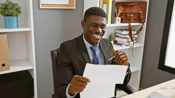 Smiling African American Man Dressed Business Attire Seated Modern Office — Stock Photo, Image
