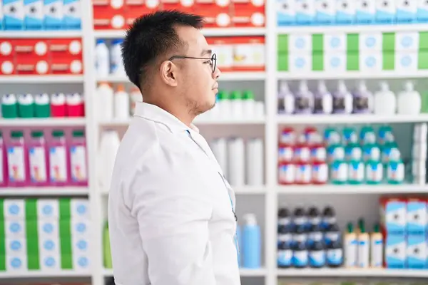 Chinese Young Man Working Pharmacy Drugstore Looking Side Relax Profile — Stock Photo, Image