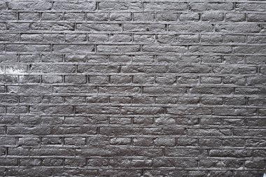 Siyah tuğladan bir duvar dokusu 