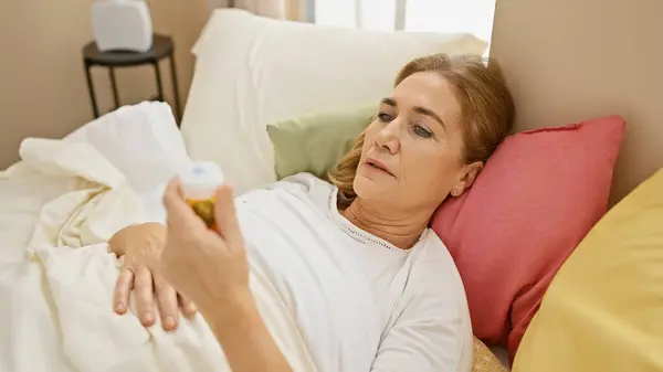 Senior Caucasian Woman Lying Bed Looking Pill Bottle Her Home — Stock Photo, Image