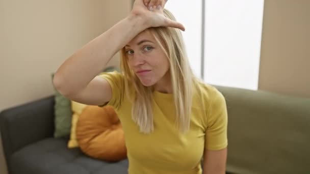 Home Young Blonde Woman Wearing Shirt Humorously Insults Teasing Making — Stock Video