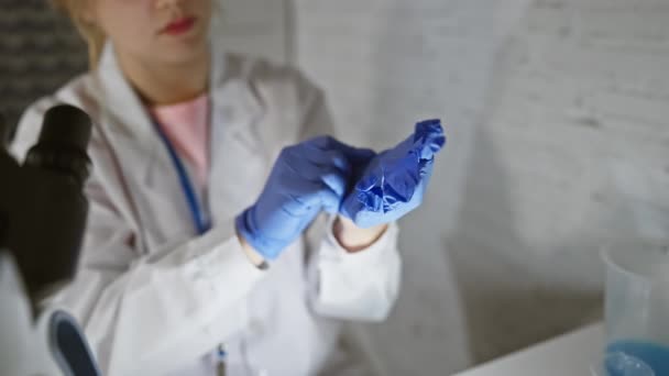 Focused Woman Scientist Laboratory Wearing Blue Gloves Lab Coat Lanyard — Stock Video
