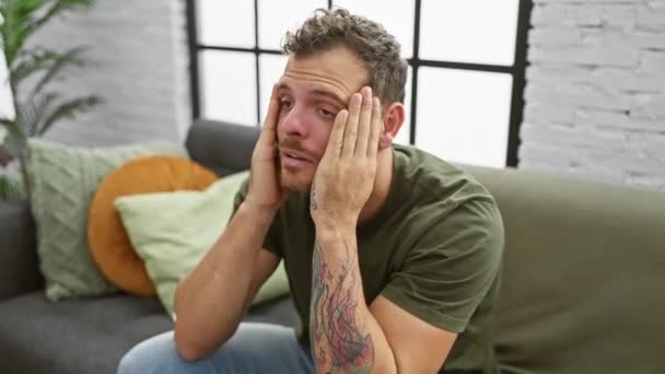 Young Man Sitting Sofa Home Suffering Stress Pain Headache Hand — Stock Video