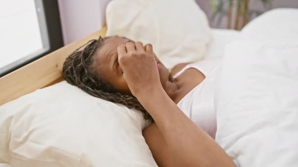 African American Woman Resting Bedroom Headache Discomfort Indoors Morning Light — Stock Video