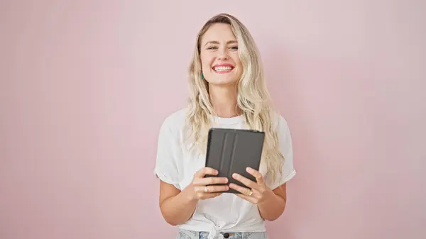 Young Blonde Woman Smiling Confident Using Touchpad Isolated Pink Background — Stock Photo, Image