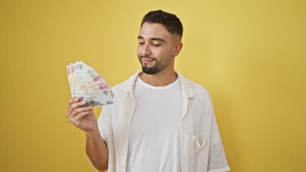 Cheerful Young Arab Man Proudly Pointing Self Uae Banknotes Smiling — Stock Video