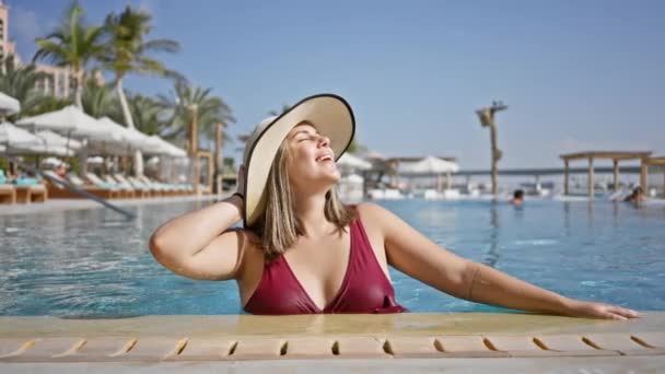 Relaxed Woman Enjoying Luxury Poolside Leisure Basking Sunlight Tropical Resort — Stock Video