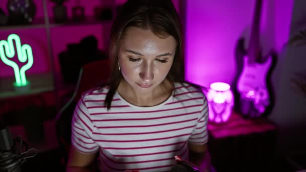 Brunette Woman Gaming Night Indoors Colorful Lights Holding Controller Wearing — Stock Video