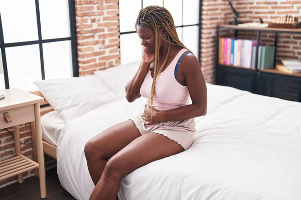 African American Woman Suffering Menstrual Pain Sitting Bed Bedroom — Foto de Stock