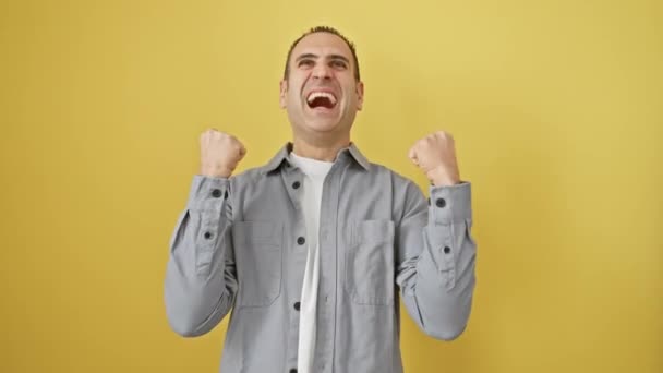 Joyful Young Hispanic Man Shirt Celebrating Big Win Saying Yes — Stock Video