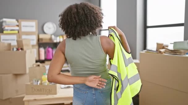 Woman Putting Safety Vest Warehouse — Stock Video