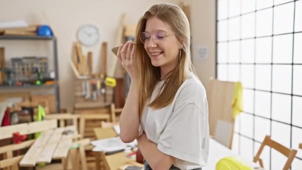 Smiling Caucasian Woman Wearing Glasses Carpentry Workshop Full Tools Wood — Stock Video