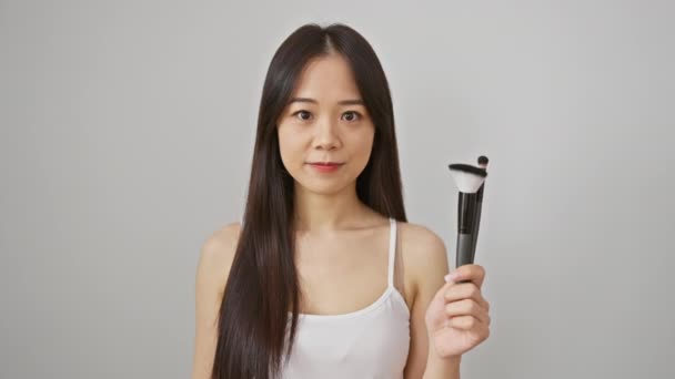 Smiling Young Chinese Woman Playfully Brandishing Makeup Brush Giving Excellent — Stock Video