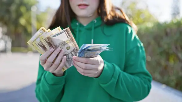Young Woman Compares Hungarian Forints Euros Outdoors Highlighting Currency Travel — Stock Photo, Image