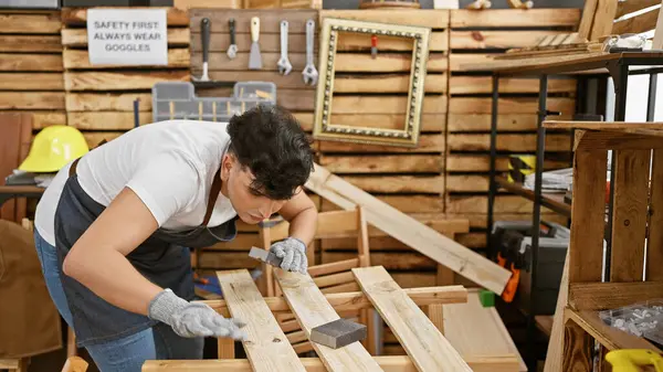 Man Engages Woodworking Using Sanding Block Concentrating Well Equipped Workshop — Stock Photo, Image