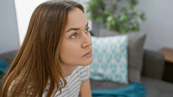 Contemplative Young Woman Brunette Hair Blue Eyes Sits Modern Living — Stock Photo, Image
