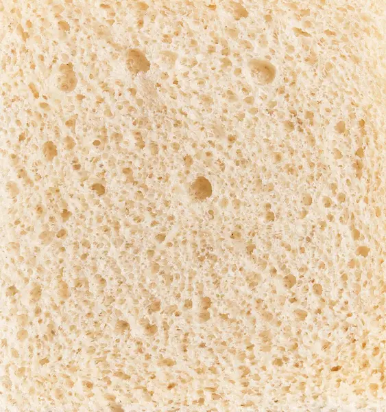 Gözenekli Yapısını Ince Detaylarını Gösteren Bir Dilim Beyaz Ekmeğin Yakın — Stok fotoğraf