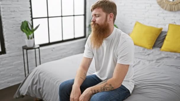 Handsome Young Redhead Man Comfortably Sitting His Bed Relaxed Morning — Stock Video