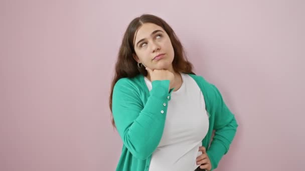 Pensive Young Hispanic Woman Pink Background Beautiful Thoughtful Standing Doubt — Stock Video