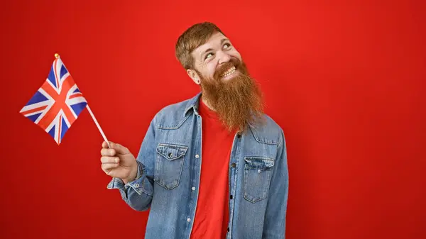 Handsome Young Redhead Man Beard Oozing Confidence Standing Isolated Red — Stock Photo, Image