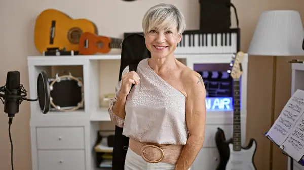 Smiling Mature Woman Gray Hair Music Studio Surrounded Instruments — Stock Photo, Image