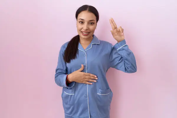 Young Arab Woman Wearing Blue Pajama Smiling Swearing Hand Chest — Stock Photo, Image