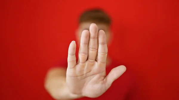 Young Hispanic Man Doing Stop Gesture Hand Isolated Red Background — Stock Photo, Image