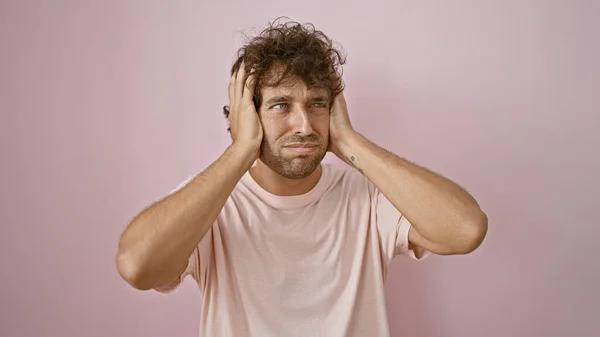 Troubled Young Hispanic Man Pink Shirt Stands Pink Wall Looking — Stock Photo, Image