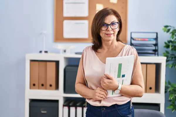 Middle Age Woman Business Worker Smiling Confident Holding Paperwork Office Stock Image