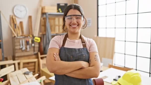 Confident Young Woman Crossed Arms Standing Carpentry Workshop Wearing Safety — Stock Video