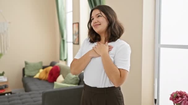 Cheerful Young Hispanic Woman Radiates Health Feeling Grateful Standing Proud — Stock Video