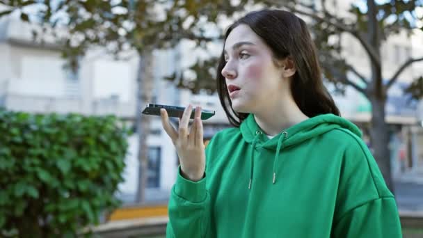 Young Woman Talking Her Smartphone Outdoor Urban Park Setting — Stock Video