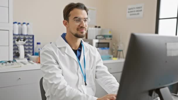 Smiling Young Hispanic Scientist Laboratory Setting Wearing White Coat Glasses — Stock Video