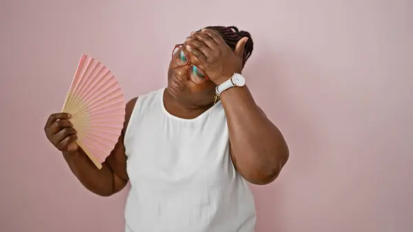 African American Woman Using Handfan Suffering Hot Isolated Pink Background — Stock Photo, Image