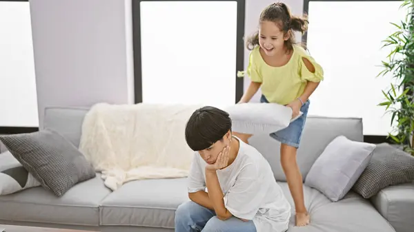 Mother Daughter Jumping Sofa Disturbing Home Relaxed Atmosphere Causes Stressed — Stock Photo, Image