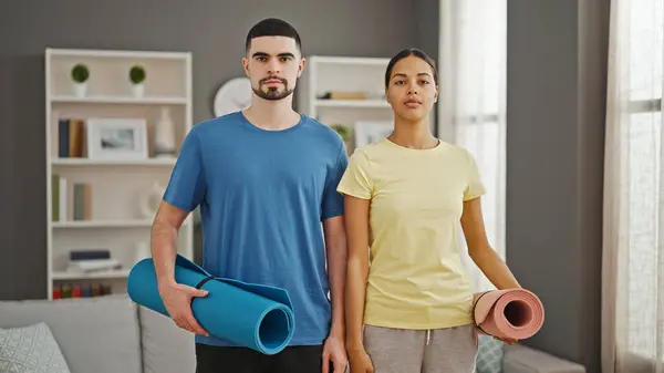 Stunningly Athletic Couple Hold Yoga Mat Standing Serious Concentration Home — Stock Photo, Image